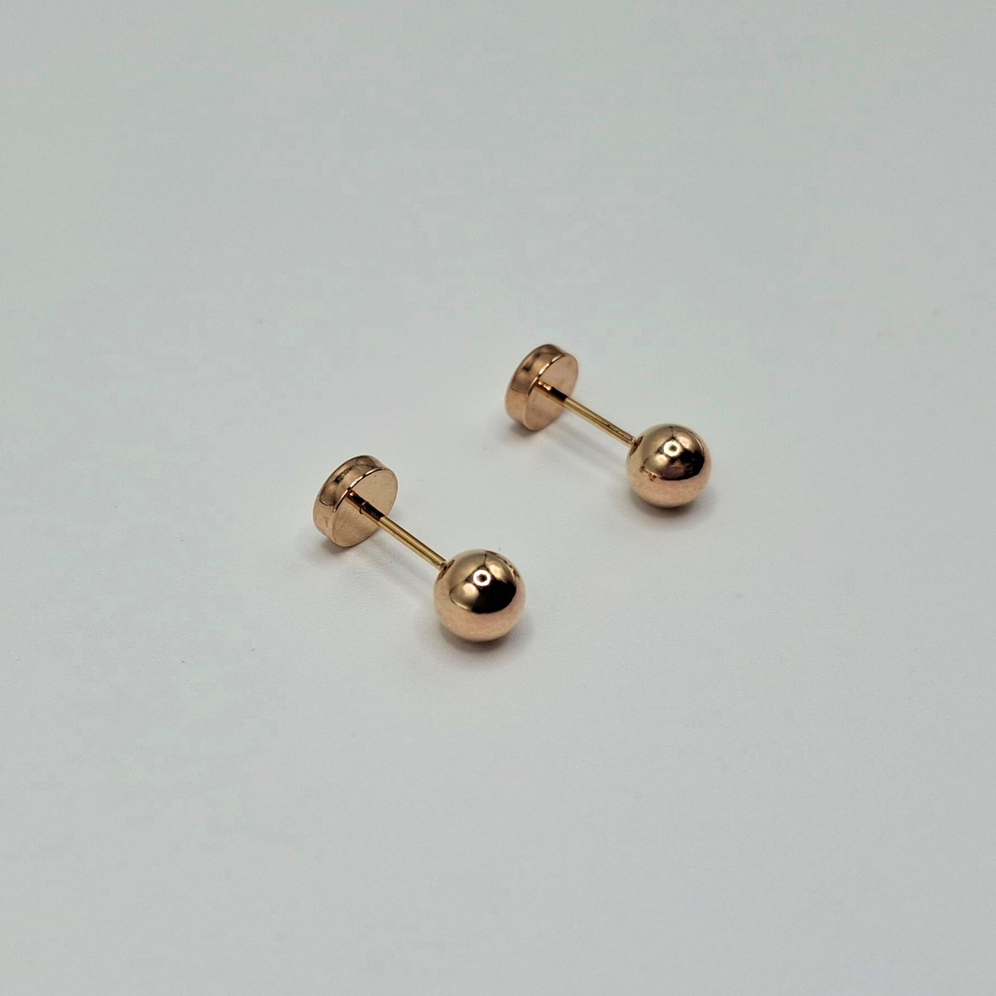 Aros abridores para bebé y niña de oro laminado 20k modelo bolita